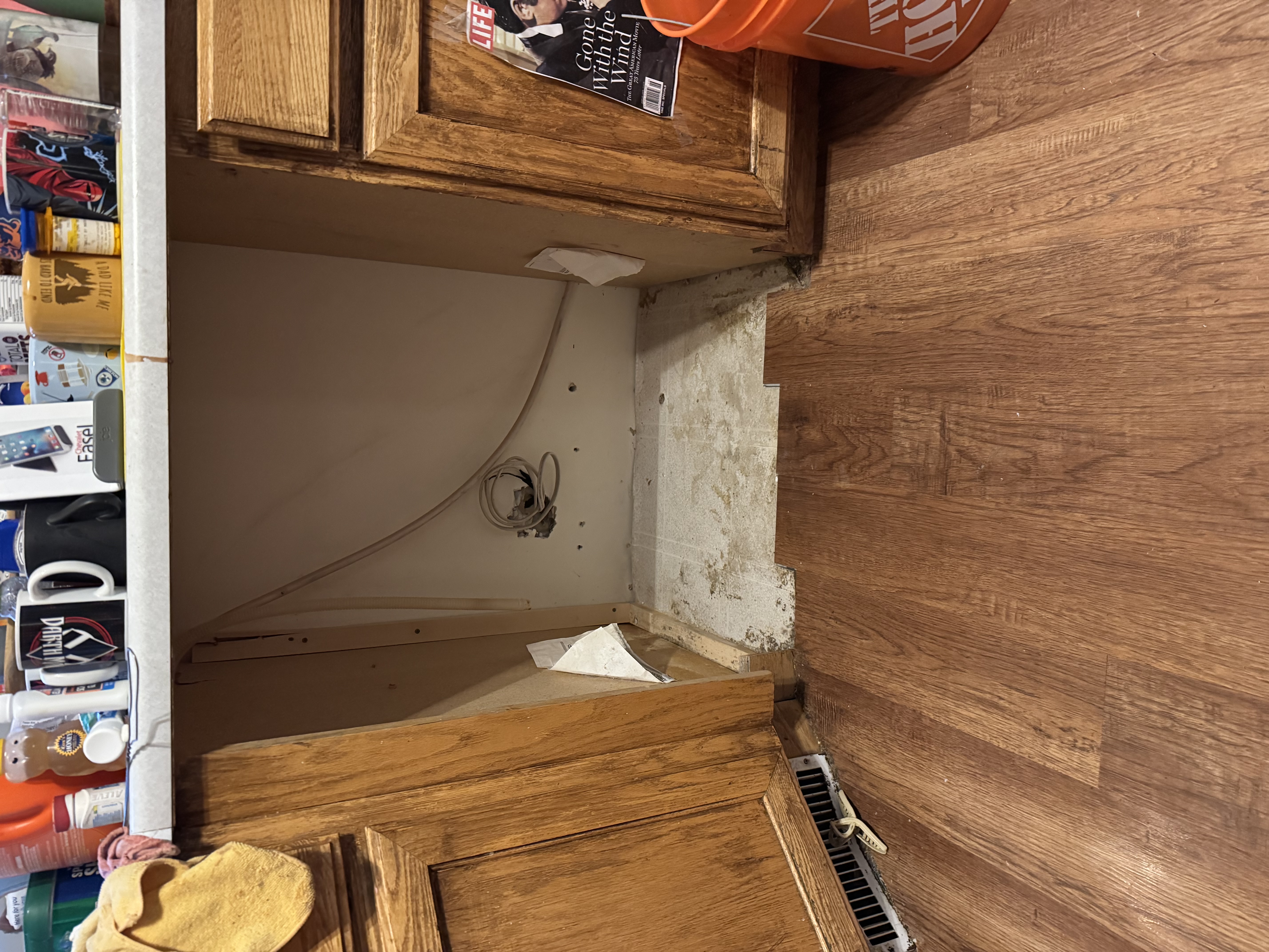 Old dishwasher removed and alcove prepped during a handyman visit by Turnkey Property Services