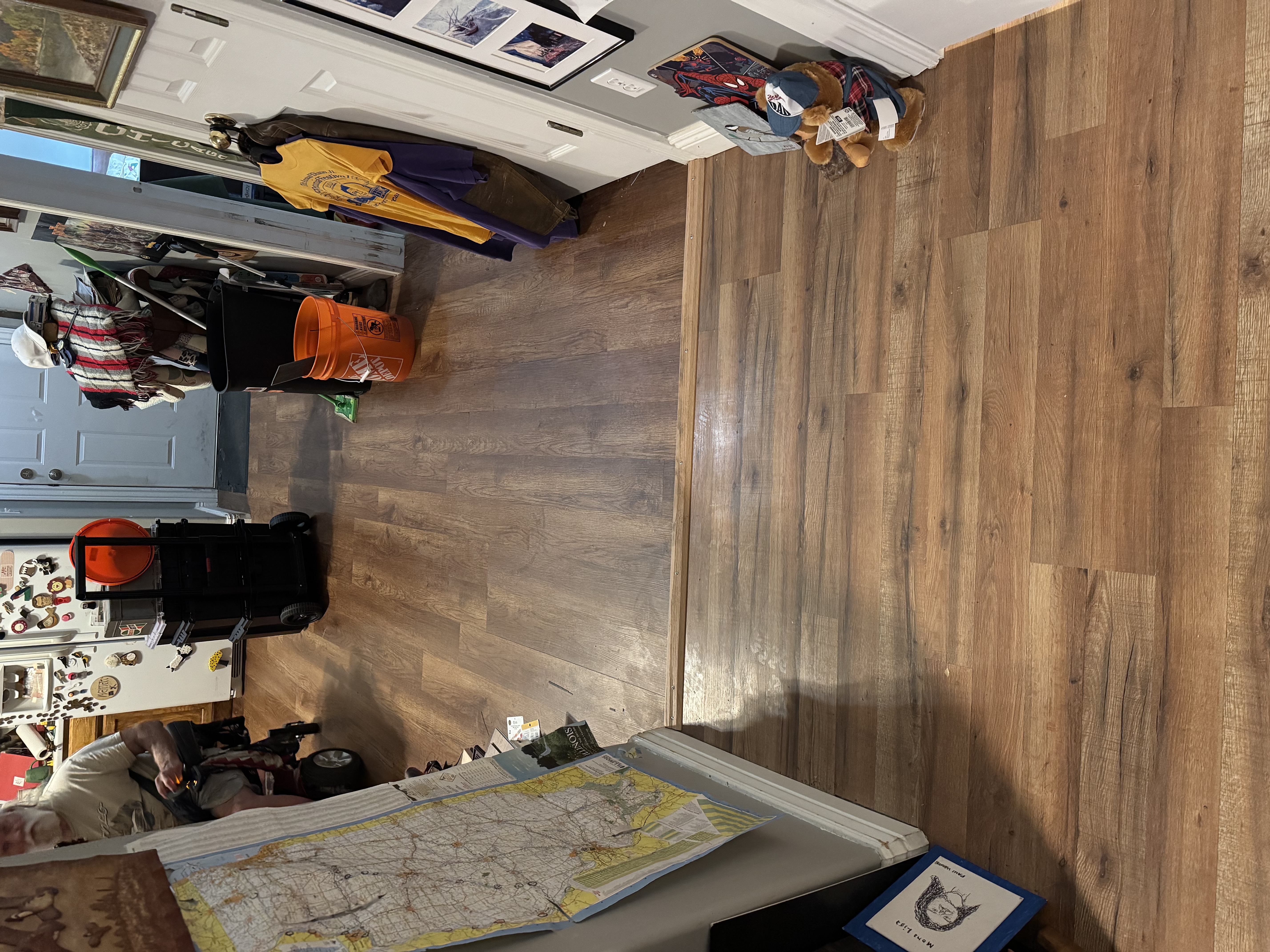 Newly installed wood-look vinyl plank flooring completed during a property turnover by Turnkey Property Services