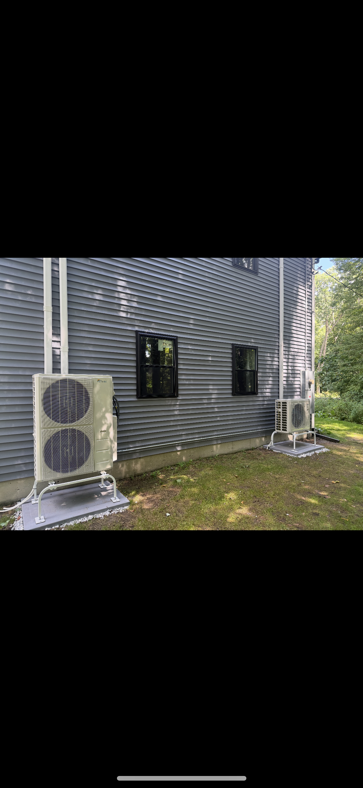 Heat pump condenser units installed at a Massachusetts home