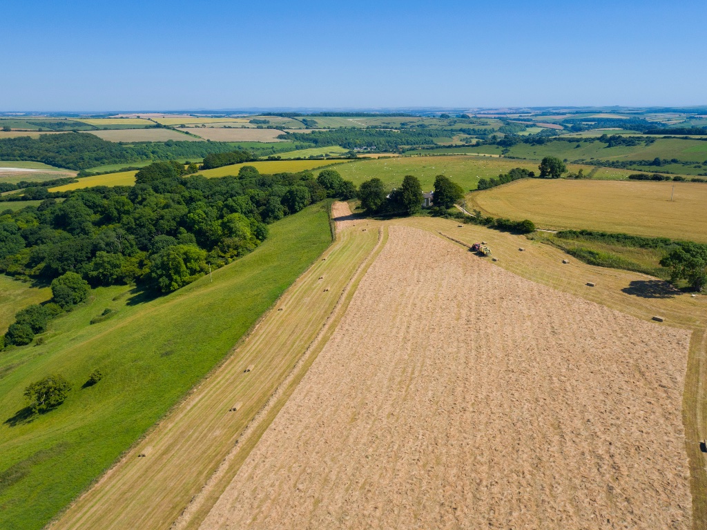 Aerial view of British countryside farmland and fields — the type of terrain covered by Airframe drone search operations