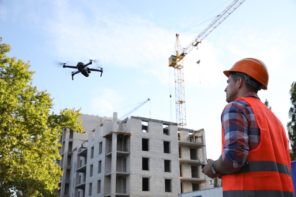 Drone pilot reviewing inspection data
