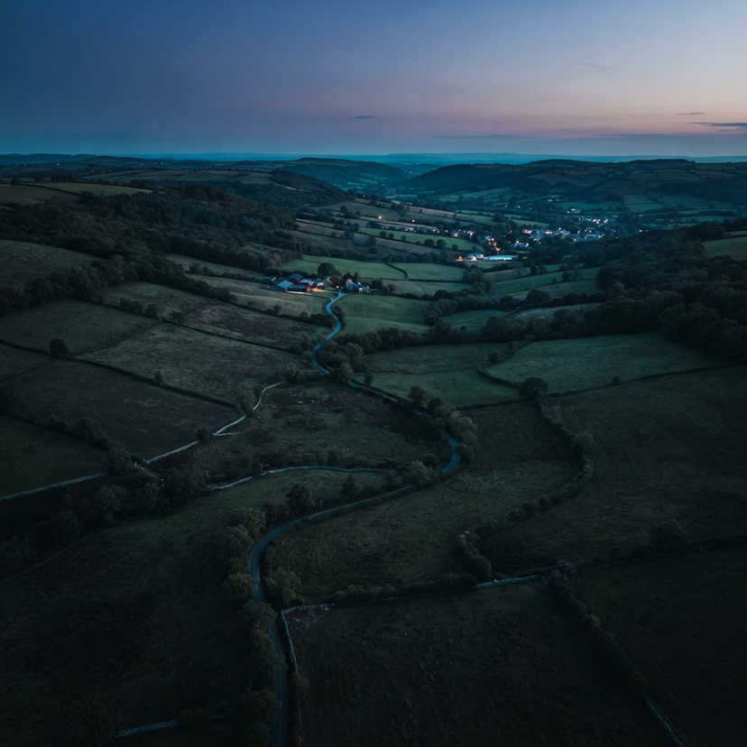 Thermal drone search operations over a rural field at twilight