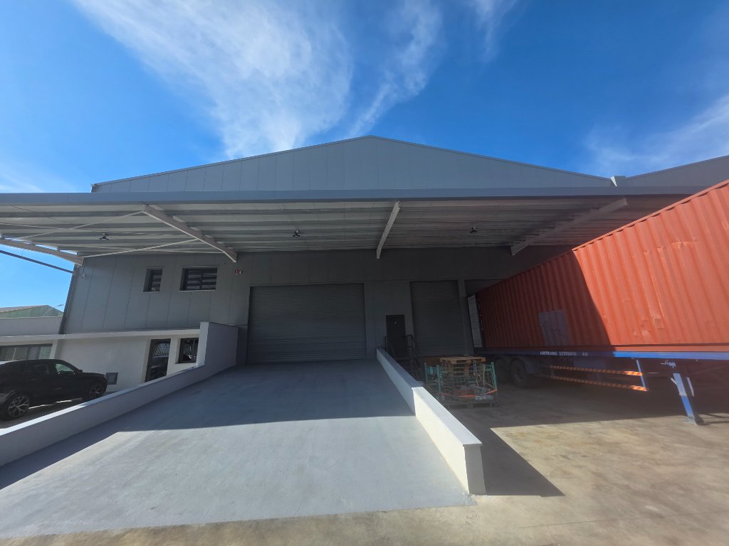 Warehouse loading bay with container truck