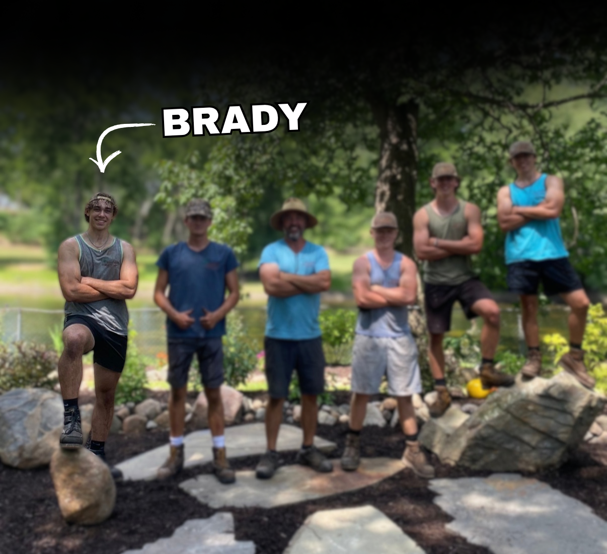 Brady Coon with the ScapeHaven team on a landscaping project