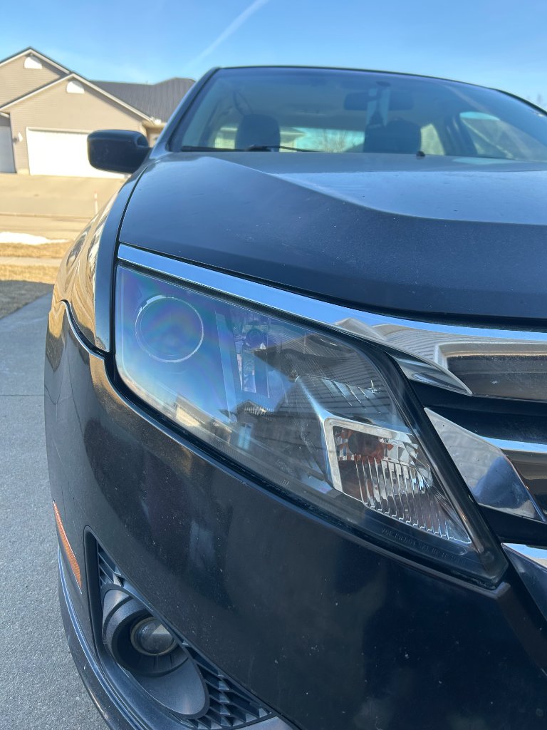 Headlight polished to optical clarity