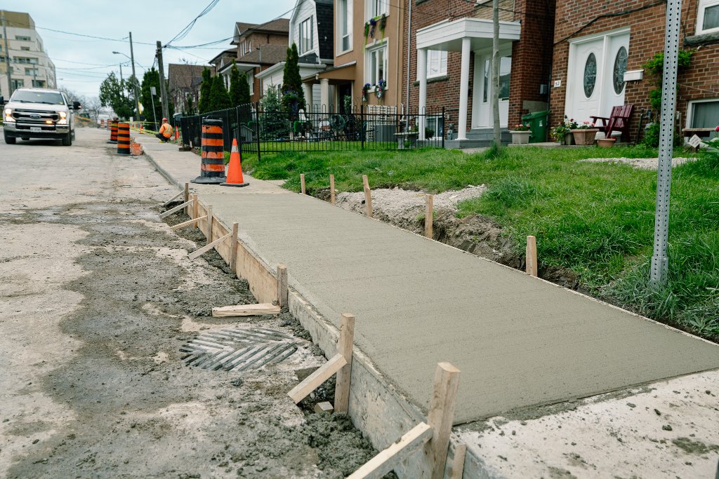 Eglinton & Caledonia — Sidewalk, Curb & Concrete Base Repair — photo 5