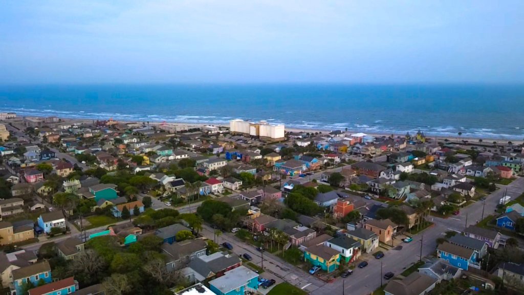Galveston Seawall neighborhood aerial — coastal streets and gulf