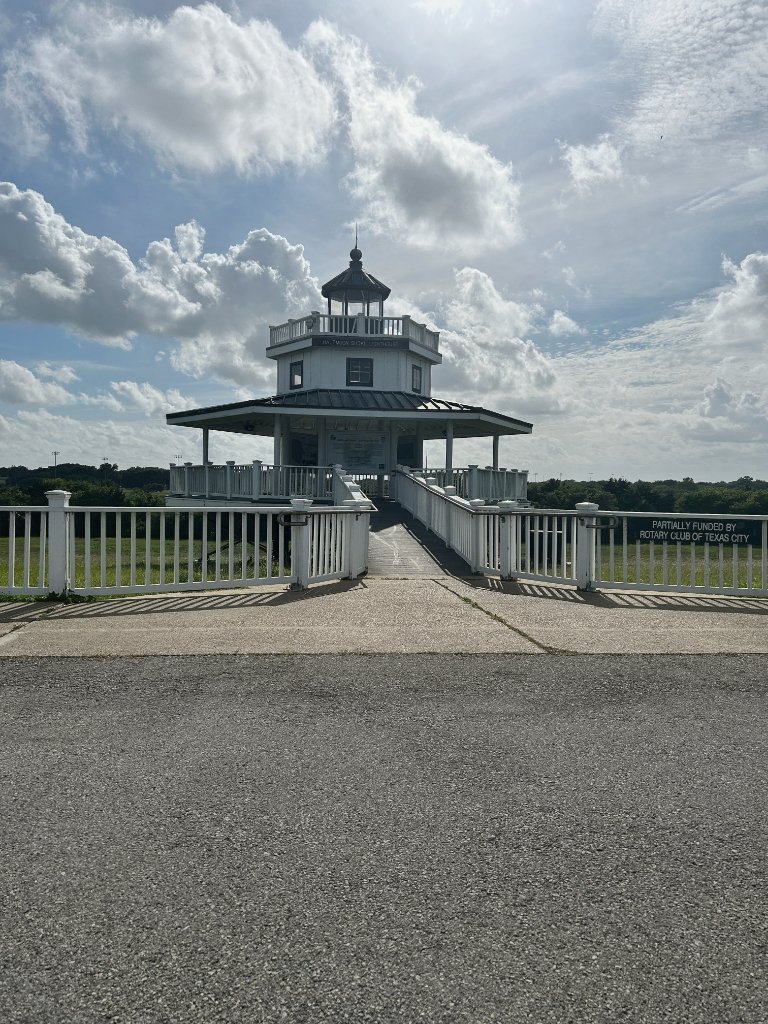 Historic Bolivar Lighthouse aerial — Gulf Coast landmark