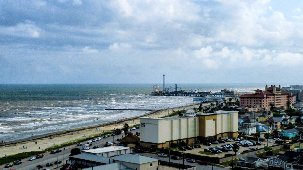 Galveston waterfront and beach pier aerial