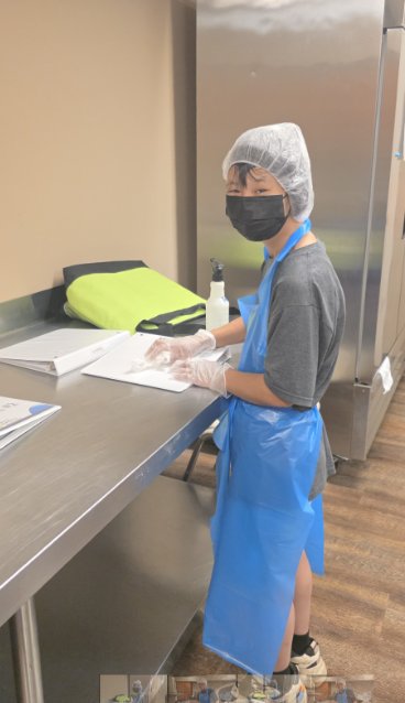 Participant volunteering in a community kitchen