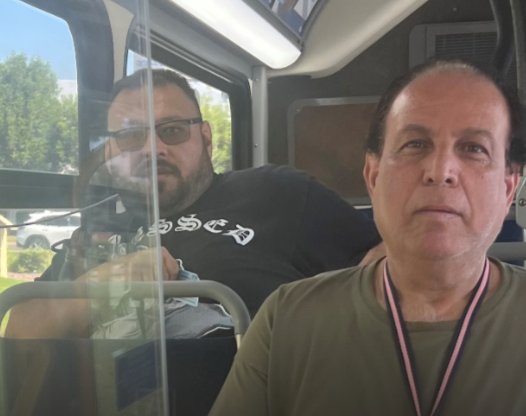 Participants wearing medals on the ride home from an event