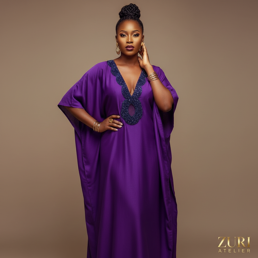 The Royal Purple Beaded Kaftan - A bold royal purple short-sleeve kaftan with a large dark blue beaded appliqué m