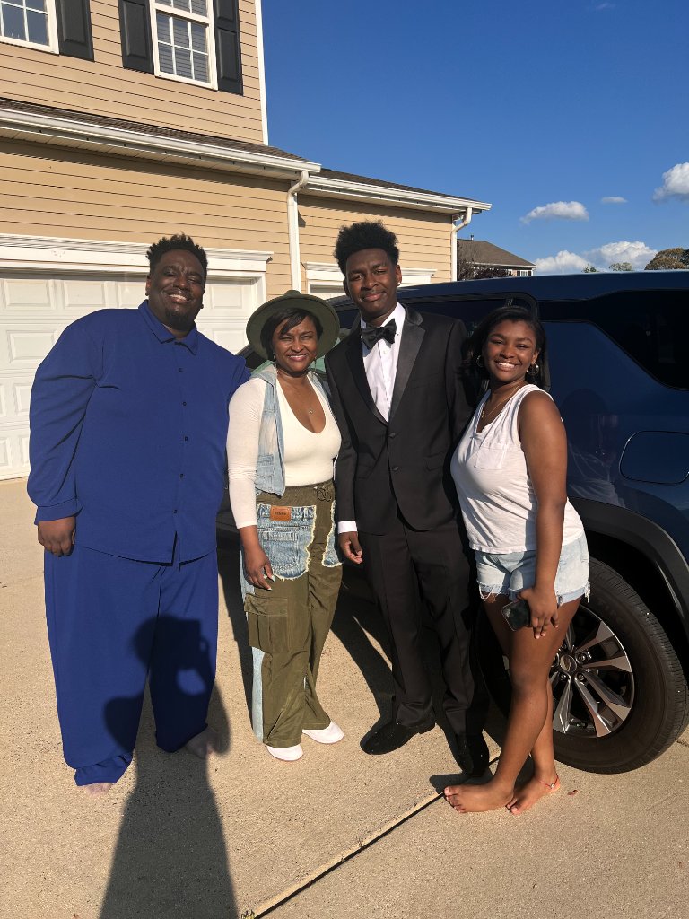 Pastor Terrance Culp with his wife Adrianne and children Emry and Loren — the Culp family at home