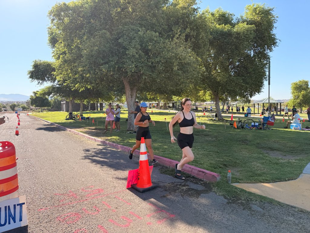 Desert Juggernauts runners racing along the course at a Bullhead City 5K event