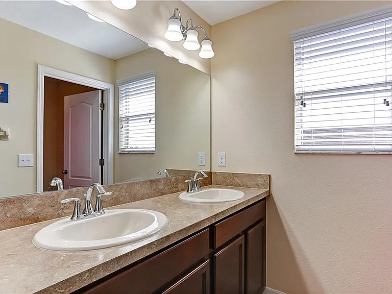 Master bath with garden tub and walk-in tiled shower