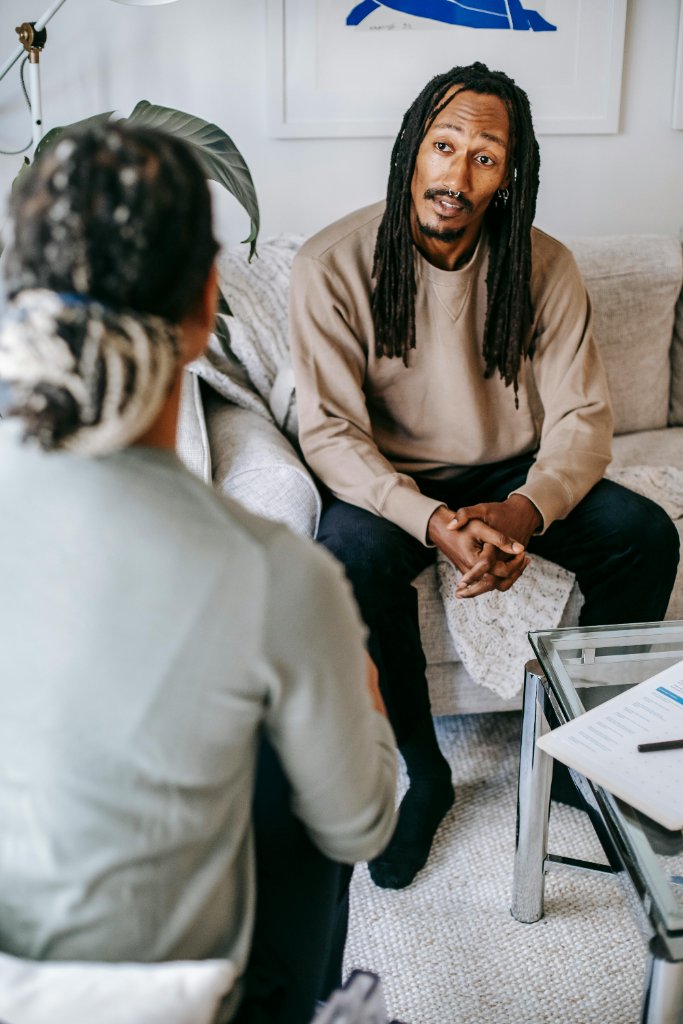 Therapist and BIPOC client in a therapy session
