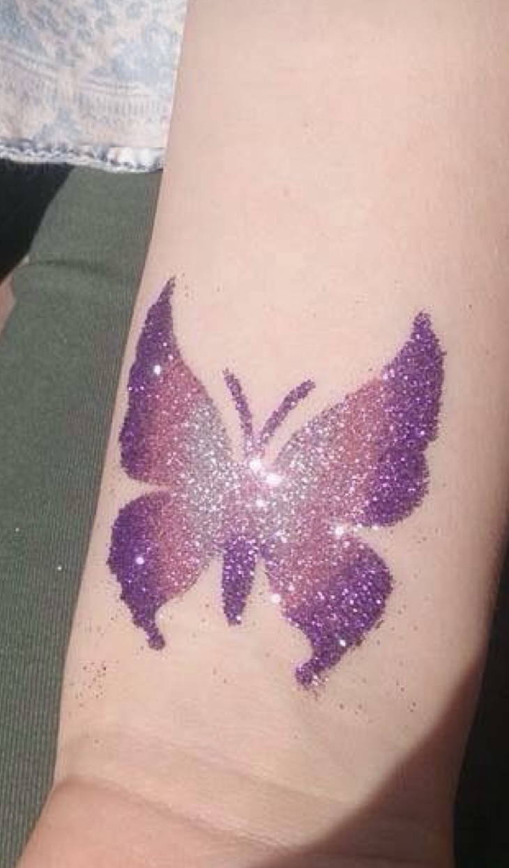 Purple and pink butterfly glitter tattoo