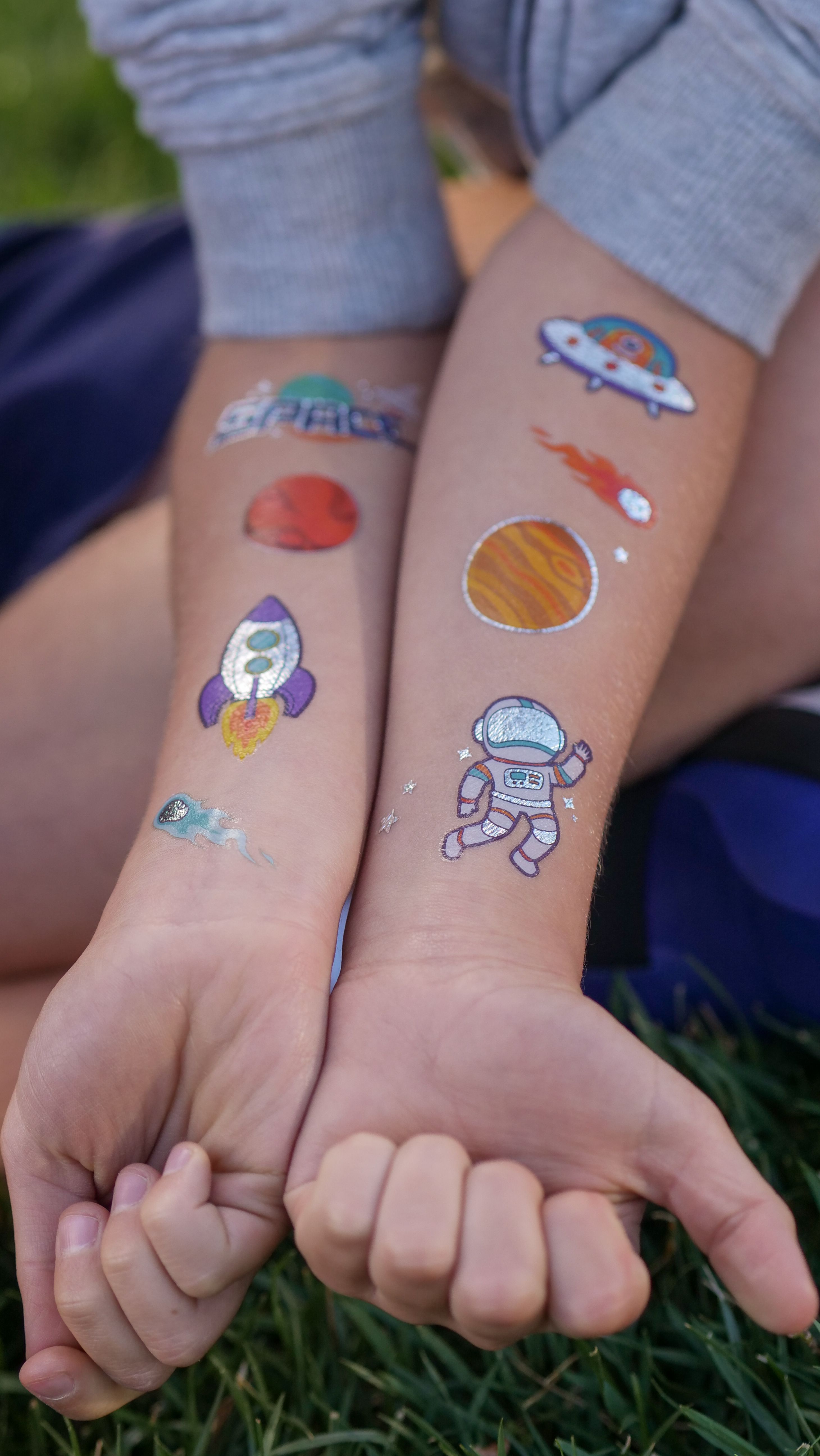 Purple floral glitter tattoos at a Calgary event