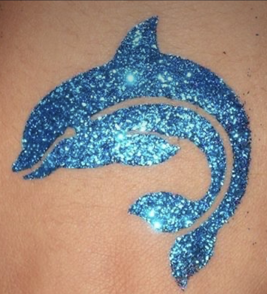 Sparkling blue dolphin glitter tattoo