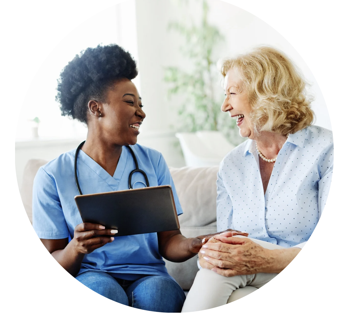 A care professional holding hands with a client