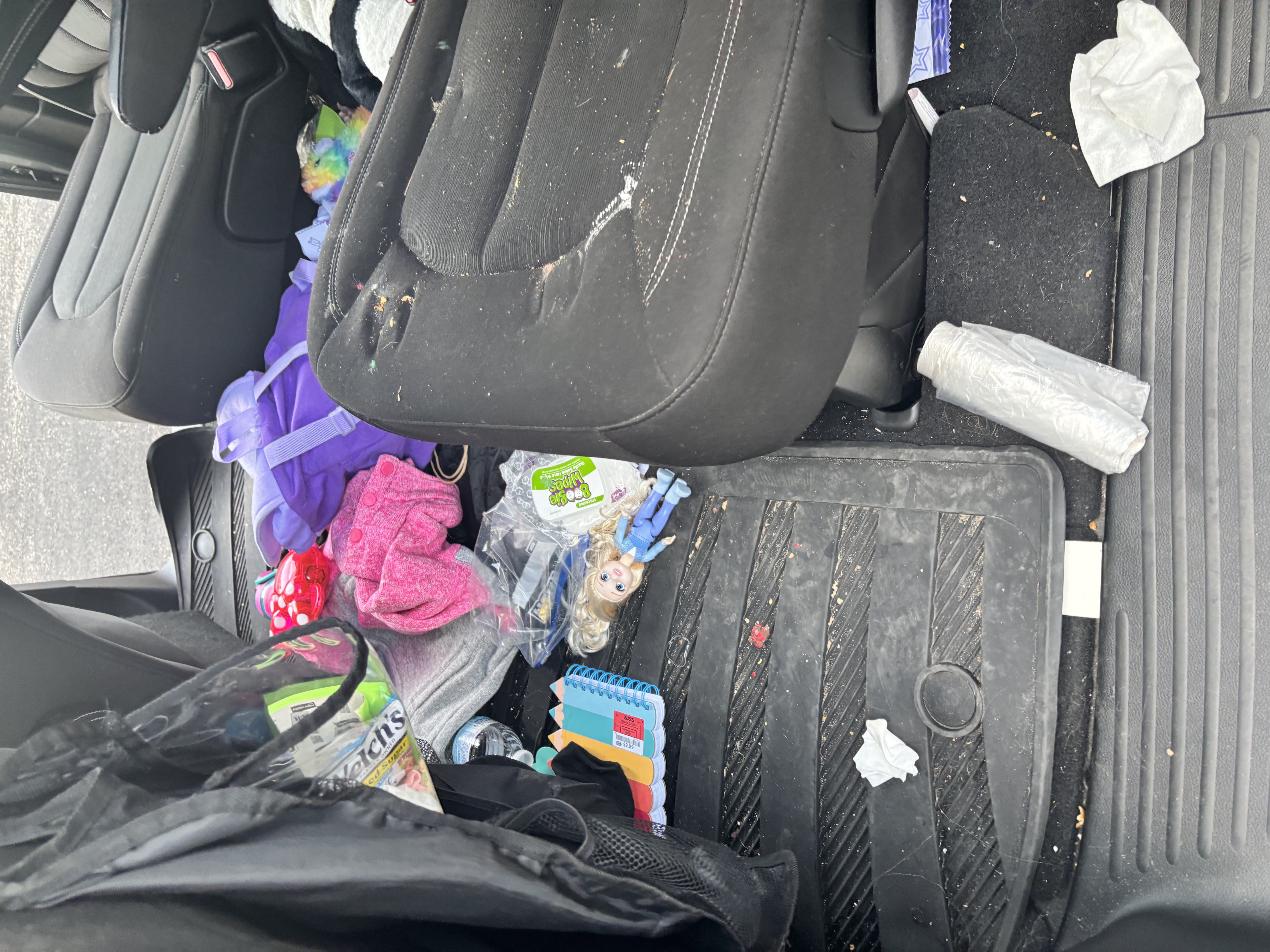 Back seat floorboard before cleaning