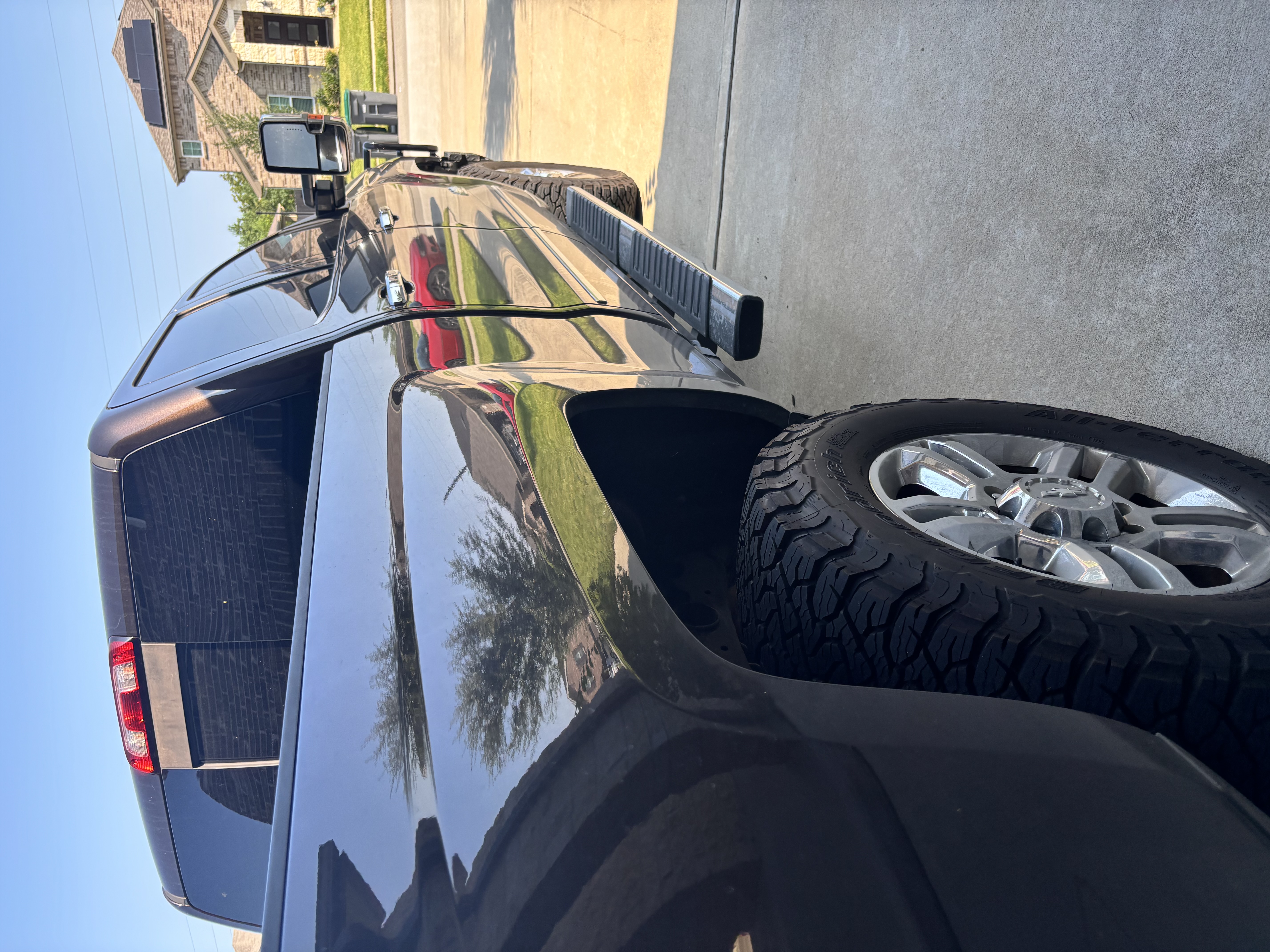 Polished pickup truck with mirror-like reflection