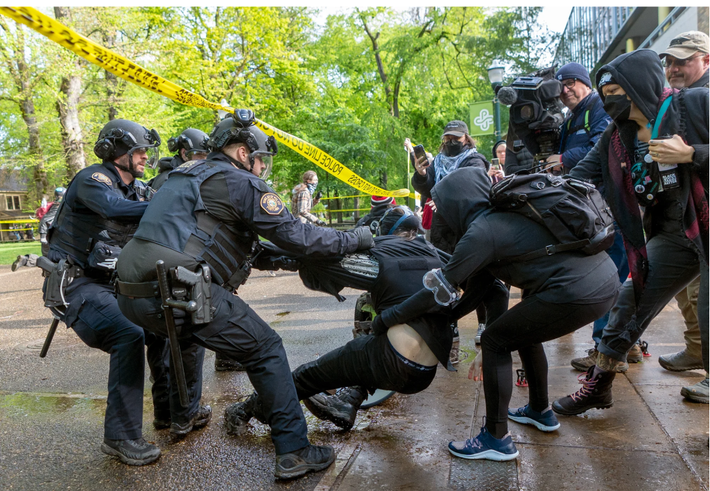 Police scuffle with protesters