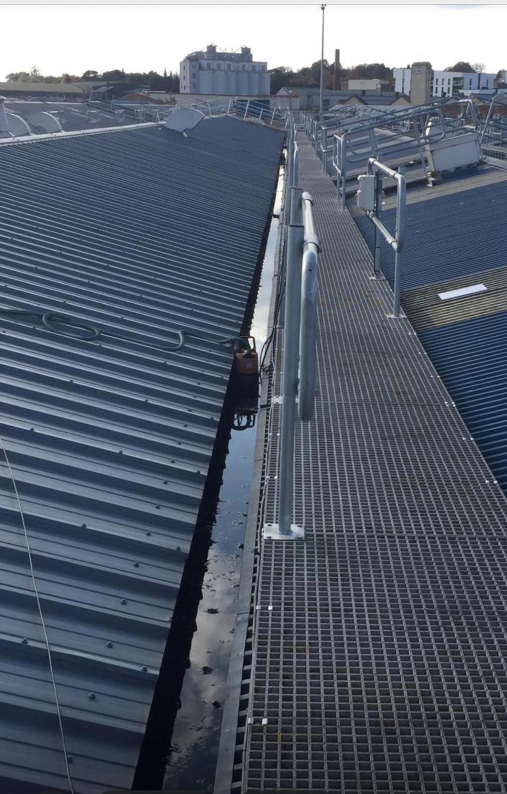 Roof refurbishment with safety access and gutter detailing