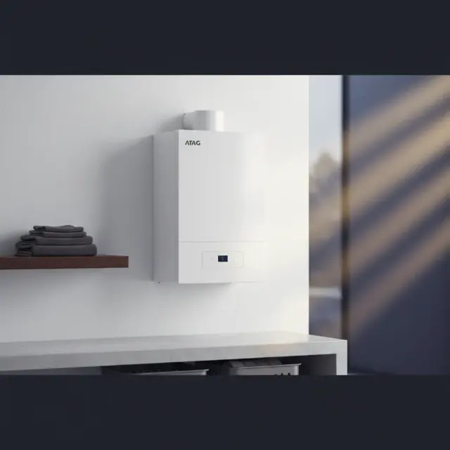 RARE Plumbing London engineer repairing an ATAG boiler in a luxury London property