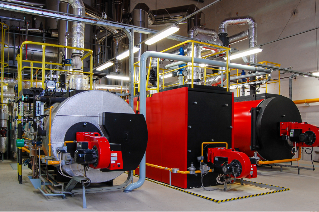 RARE Plumbing London commercial heating engineer repairing a Hamworthy commercial boiler in London