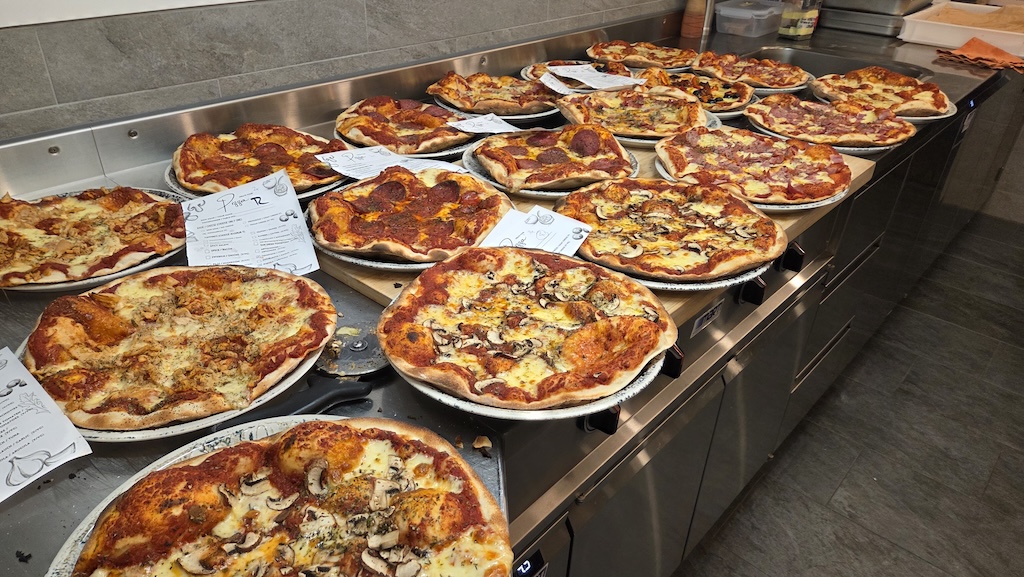 Freshly baked pizzas in the hostel kitchen