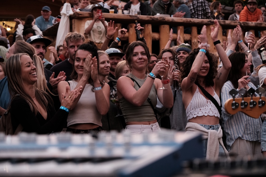 Crowd clapping during live music performance