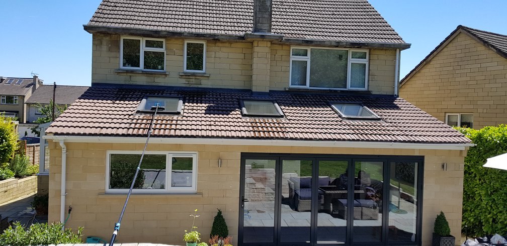 Professional window cleaning on a Bristol stone property