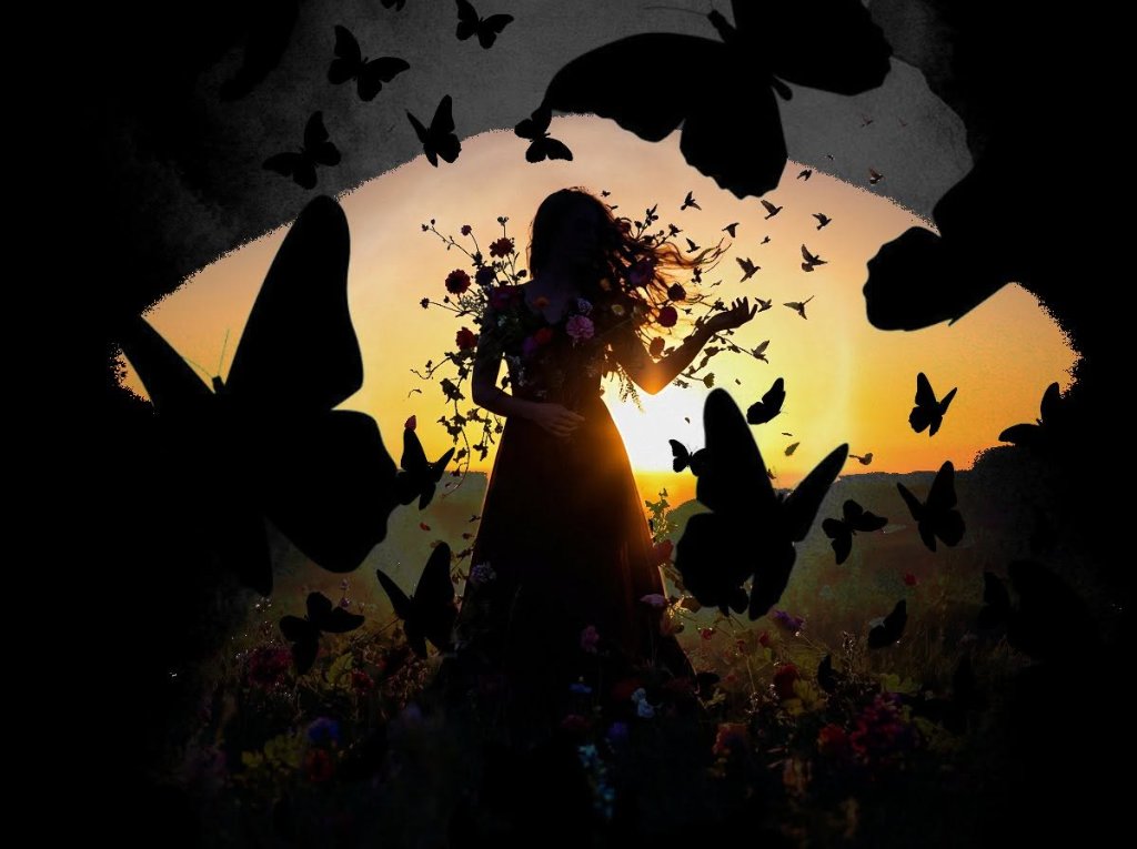 Woman silhouette draped in flowers surrounded by butterflies at sunset