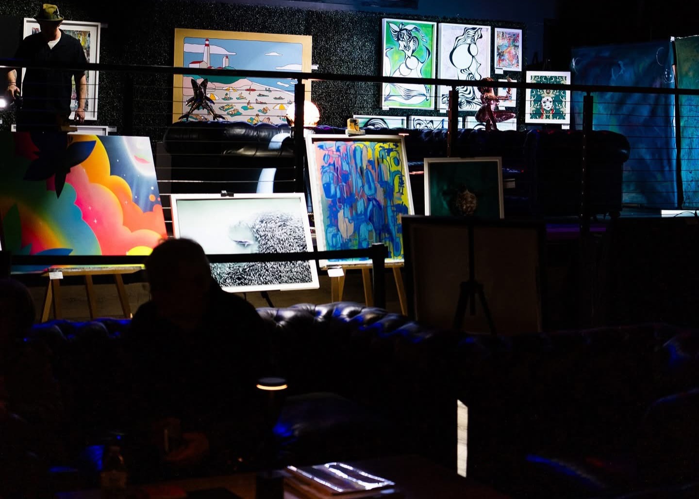 Art Hampton exhibition with collectors and artists gathering at an elegant Hamptons gallery event