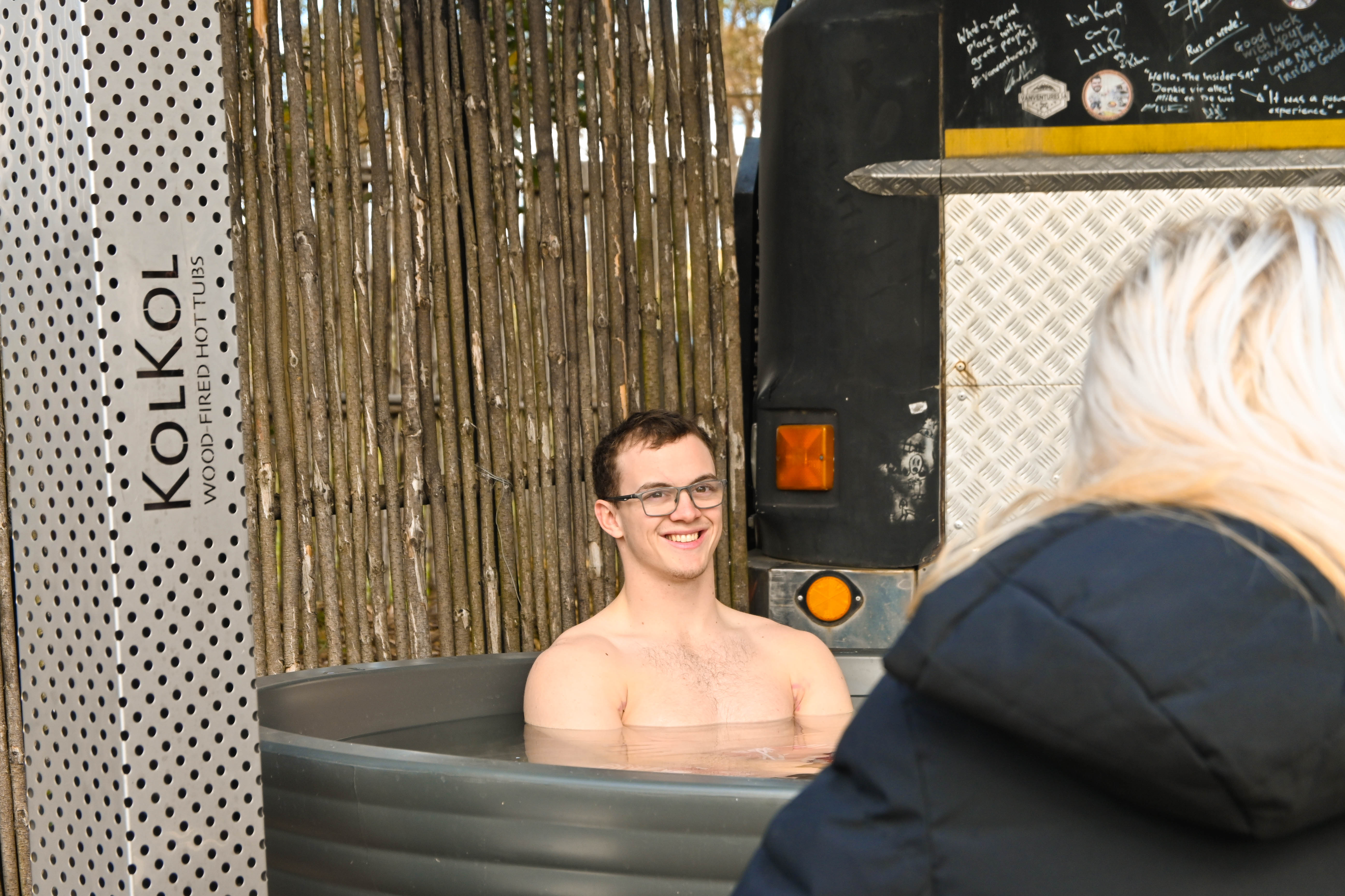 Relaxing in the wood-fired hot tub