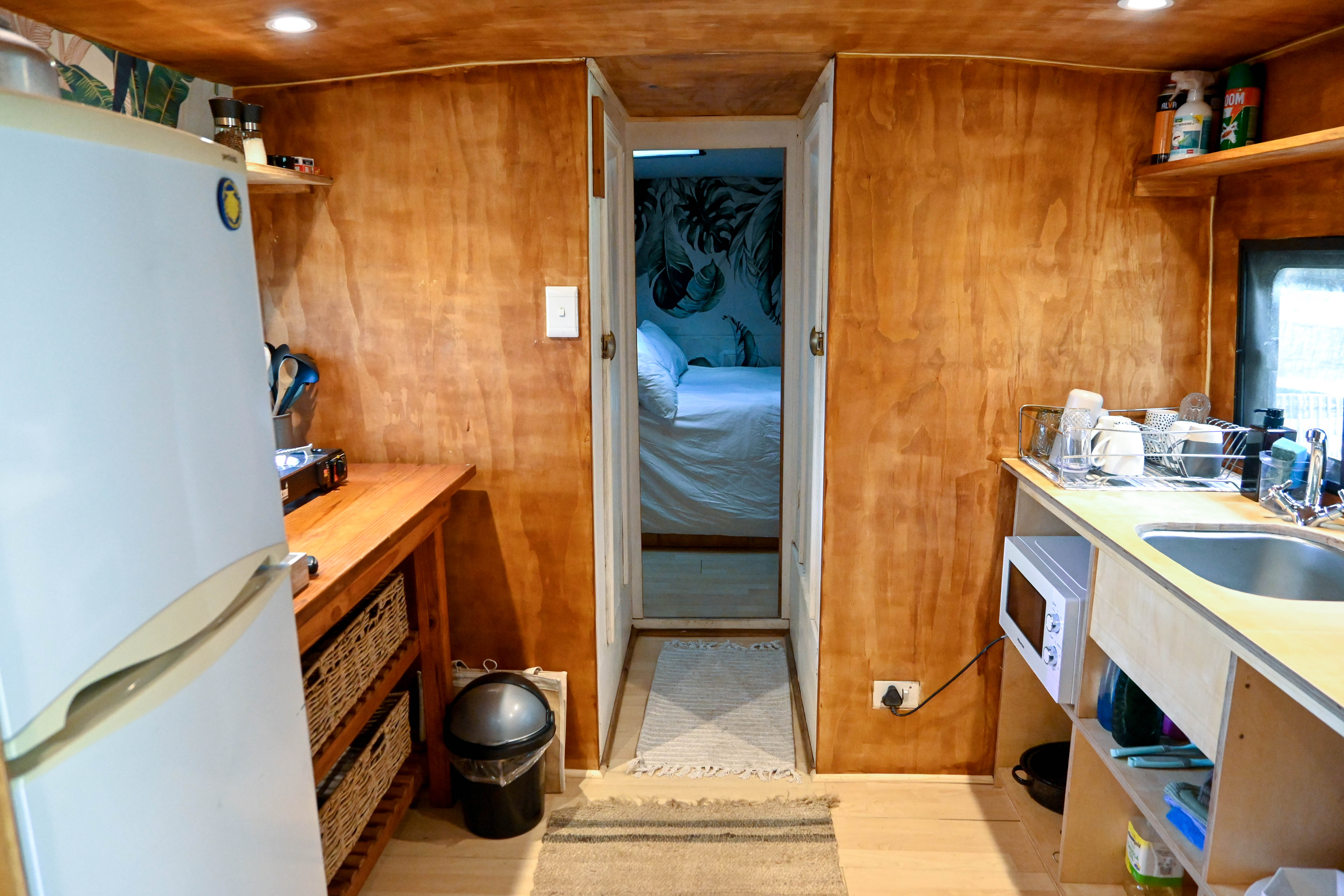Bus kitchen leading to bedroom