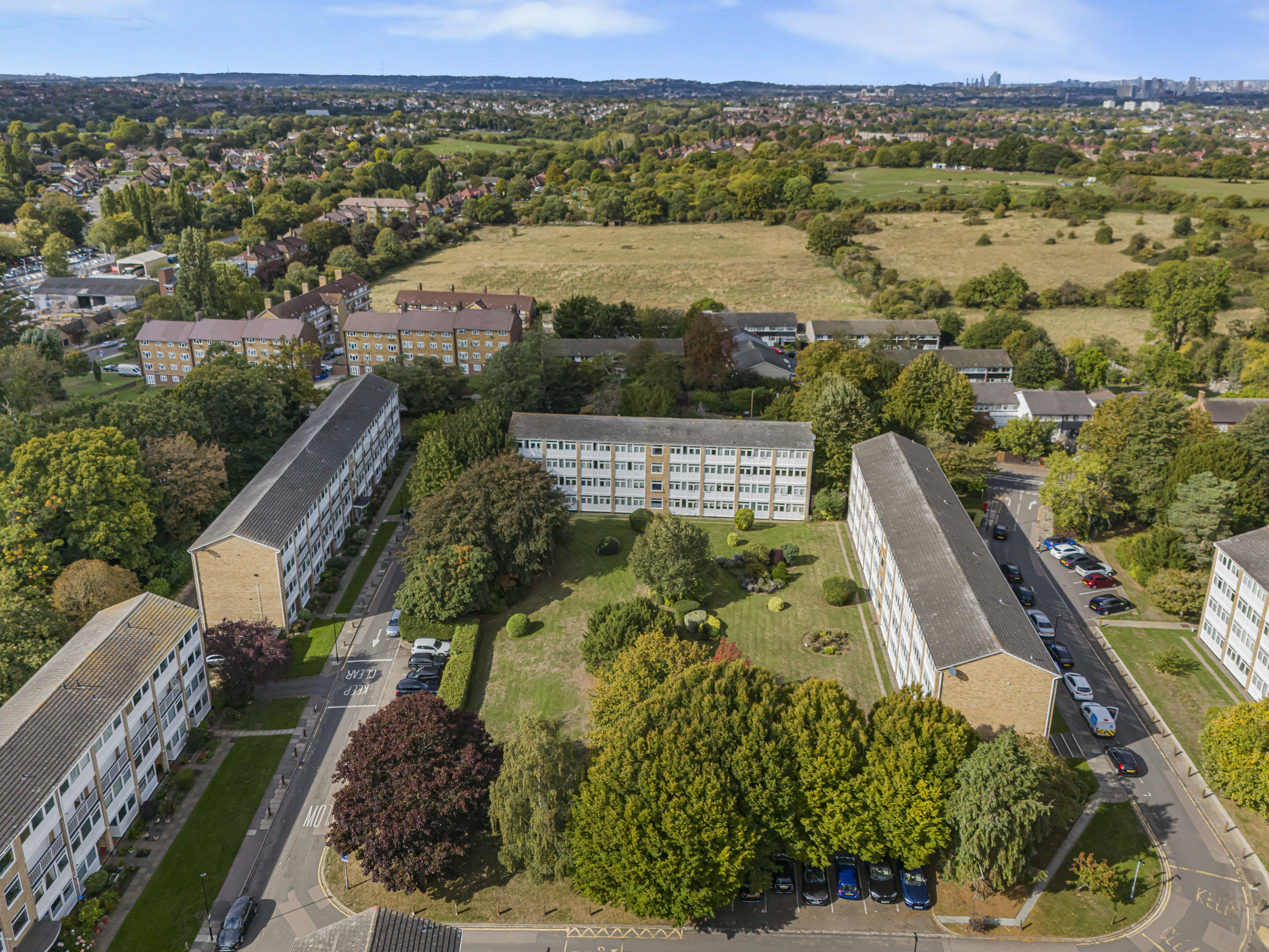 Aerial drone view of Tarnwood Park, Eltham SE9 — 140-apartment residential estate managed by Archery Estates block management London