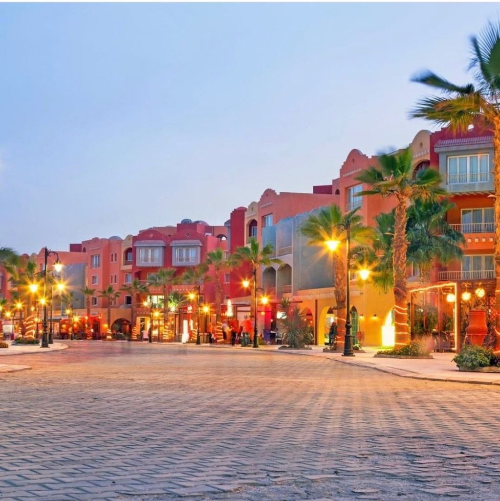 El Gouna colourful marina street lit up at night