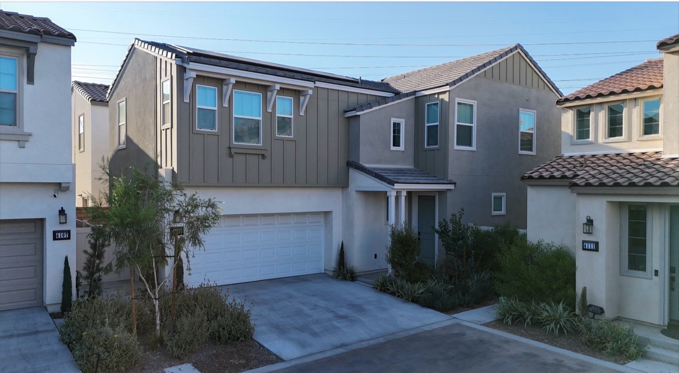 Modern two-story home with siding and stucco façade