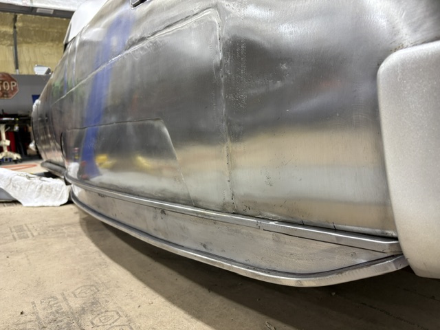 Rocker and lower trim — chrome-finished lower accent strip in place
