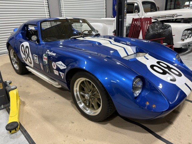1964 Shelby Daytona Coupe — #98, Le Mans blue with white racing stripes