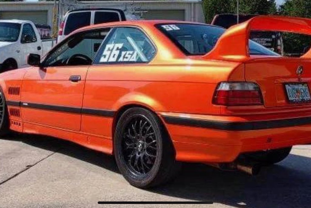 BMW E36 autocross weapon — custom louvered fenders, race livery