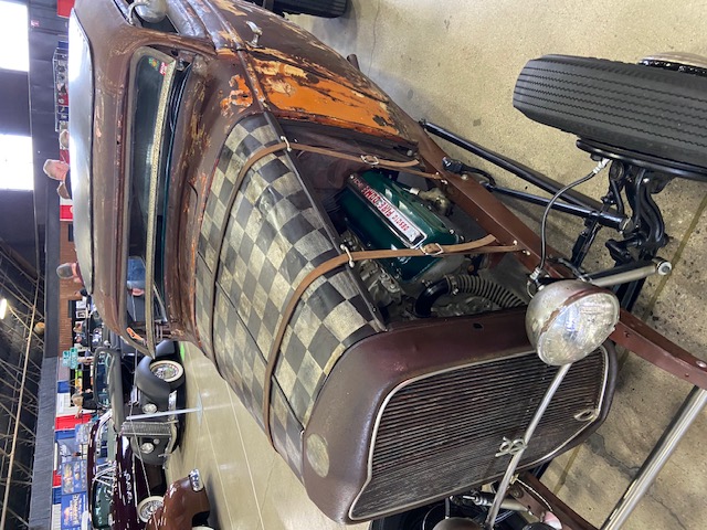 Checker-hood rat rod — indoor Grand National Roadster Show