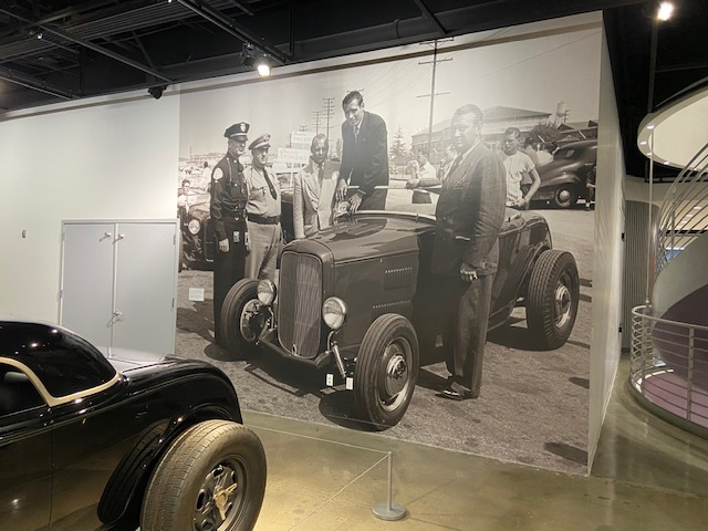 Petersen — vintage photo mural of hot rod builders at work