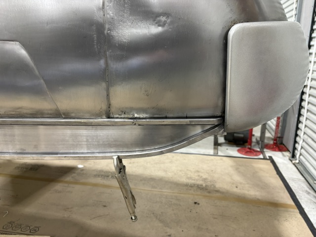 Fender skirt attachment — removable two-bolt mounting hardware in place