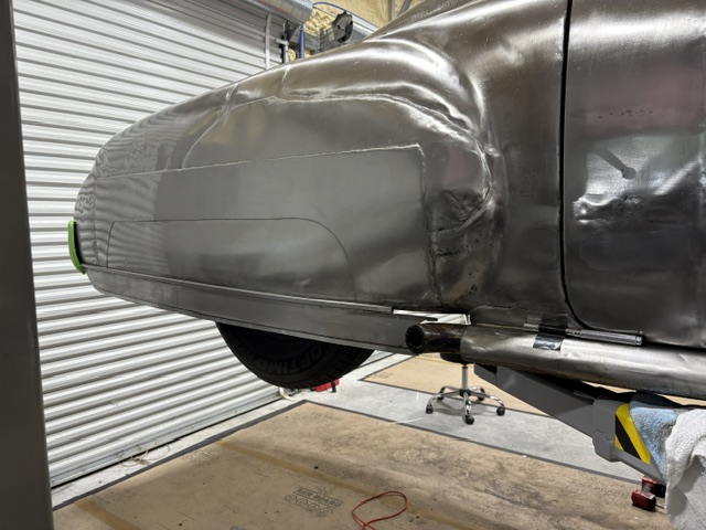 Rear lower body — custom panel matching the elegant Buick body sweep