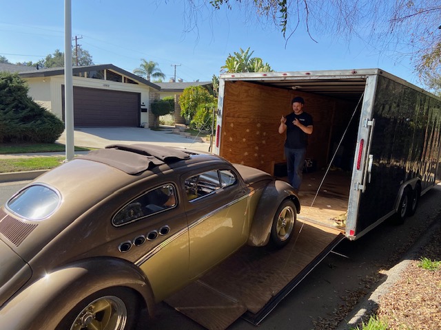 Loading a custom into the trailer — delivery day
