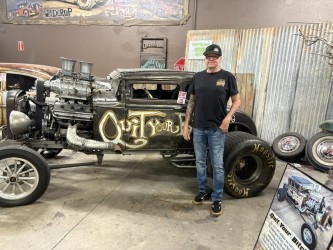 Wayne with "Quit Your Bitchin" rat rod — blown coupe, drag slicks