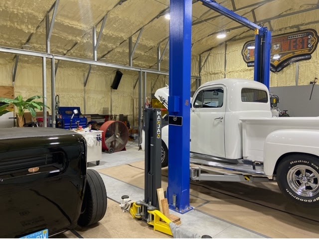 1950 Ford down on the floor — white paint, fresh trim, new rubber